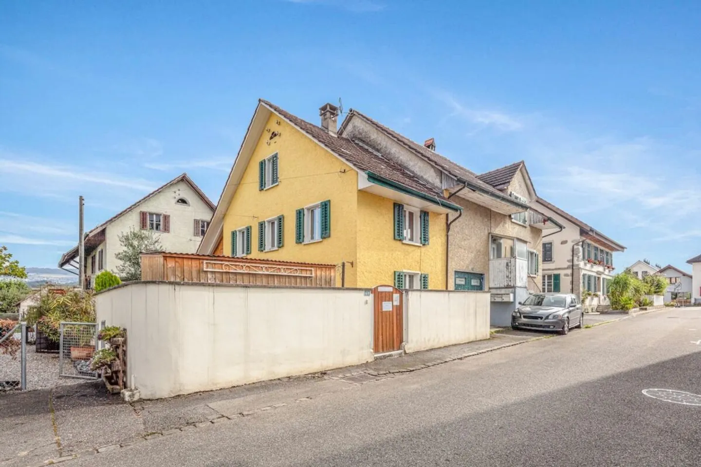 SINGLE-FAMILY HOUSE WITH POTENTIAL - Photo 1 of 12