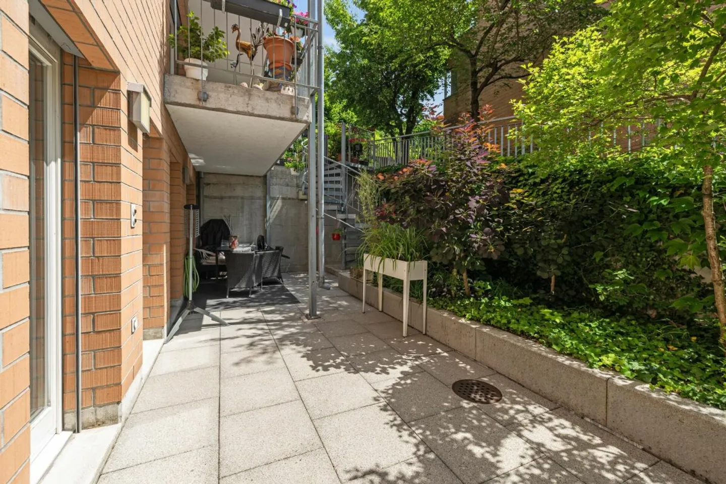 Modern Living on Two Floors with Courtyard and Seating Area - Photo 13 of 13