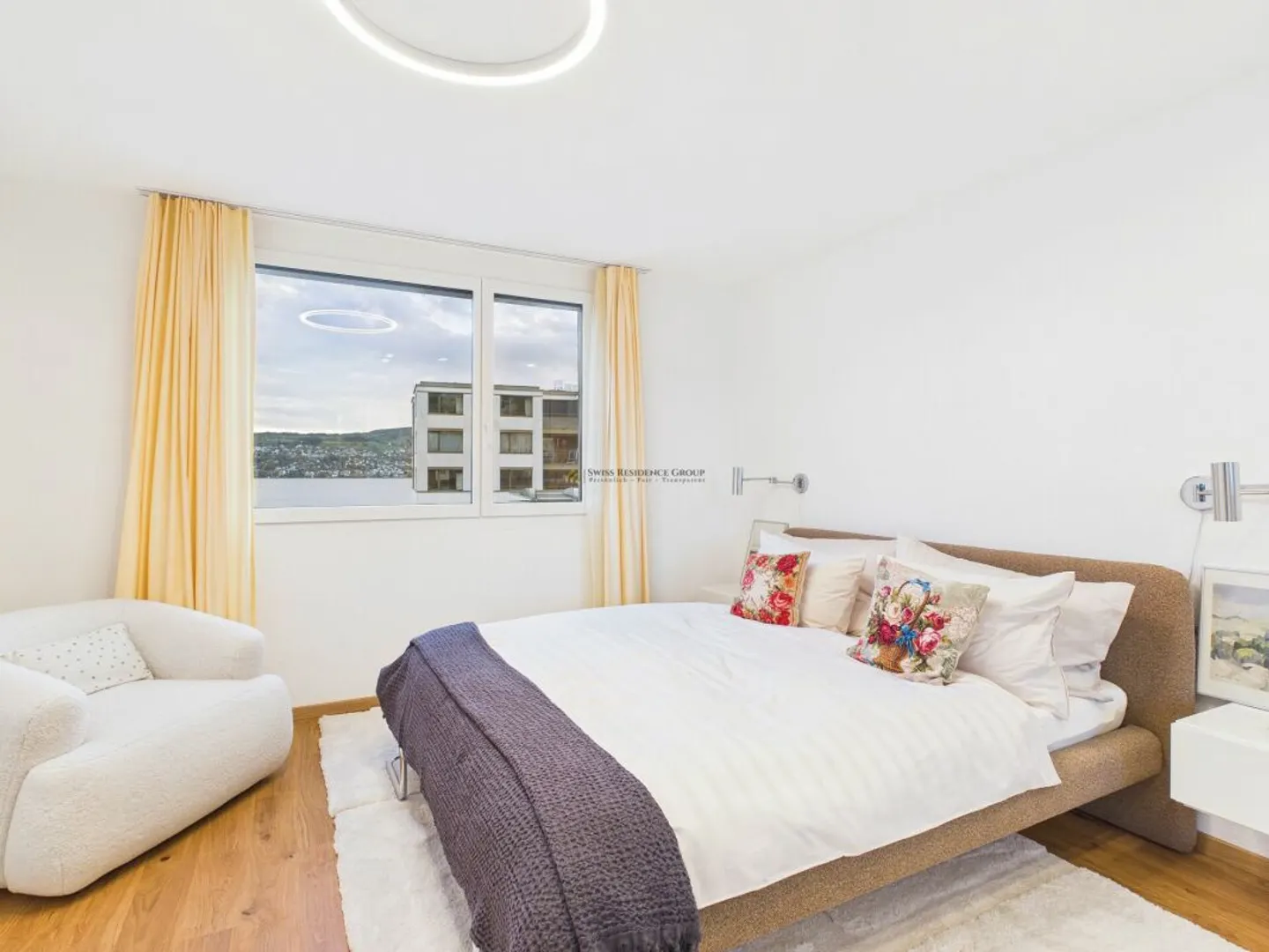 Exclusive Penthouse Apartment with Lake View in Prime Location - Photo 2 of 13