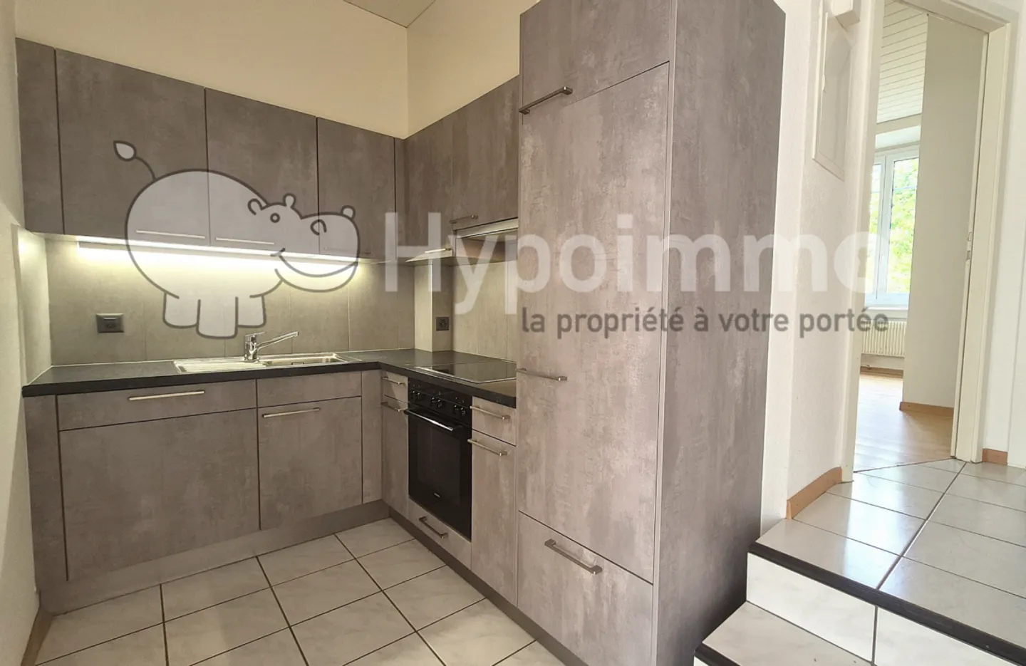 3-Zimmer-Wohnung im Erdgeschoss in La Chaux-de-Fonds - Foto 2 von 9