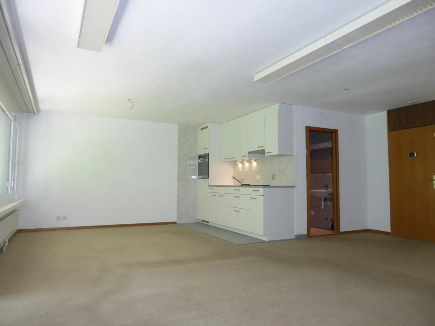 1.5-Zimmer-Studio-Ferienwohnung mit Gartensitzplatz und Tiefgaragenplatz - Photo 1 sur 13