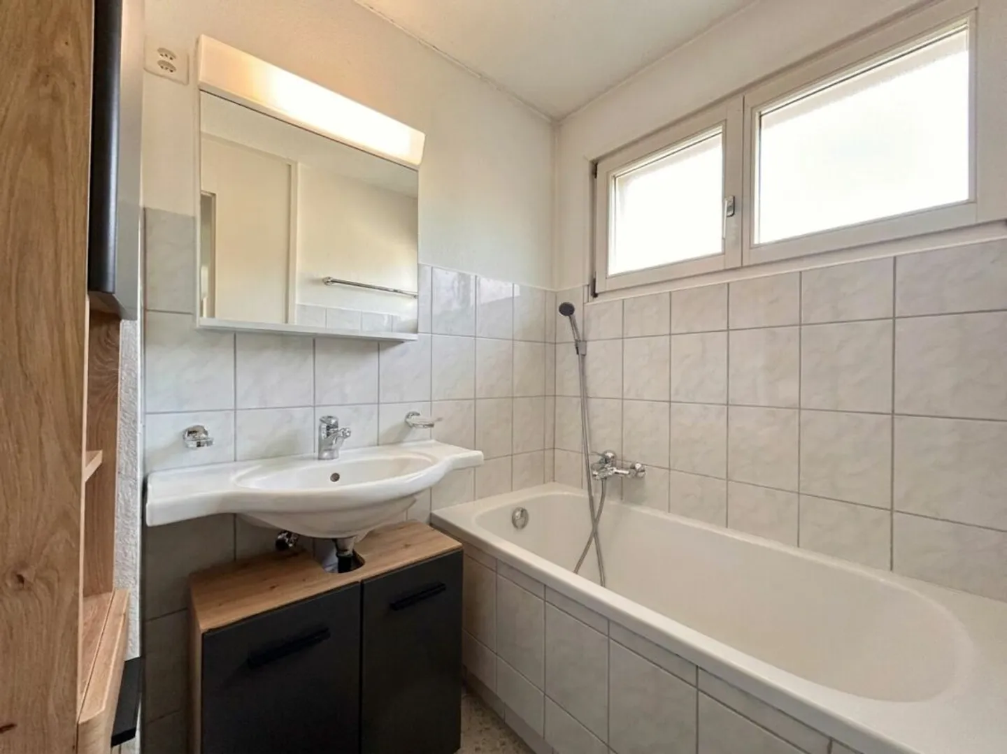 Row House in Sunny Hillside Location with Garage - Photo 9 of 13