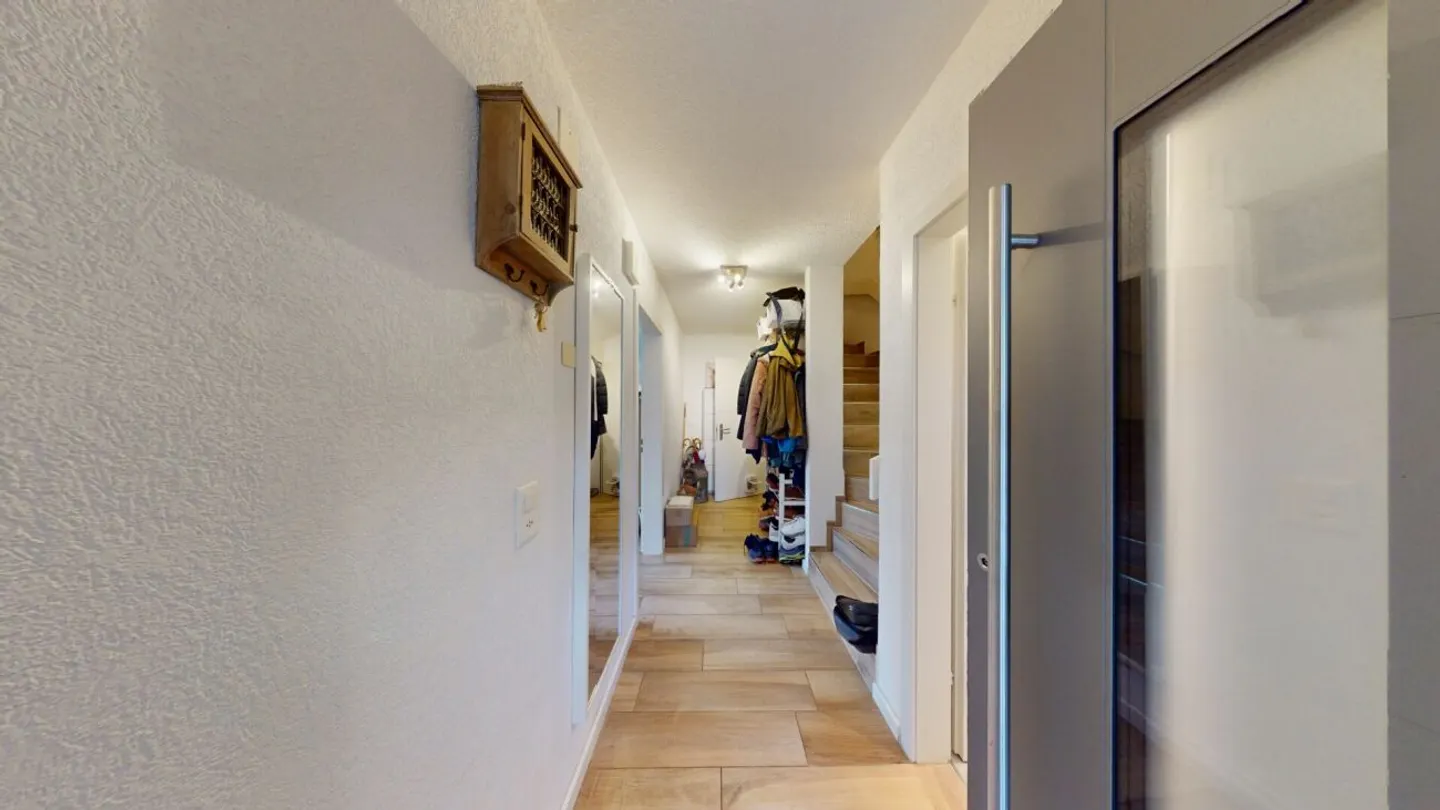 Charmantes Doppeleinfamilienhaus mit Garten - Foto 13 von 13