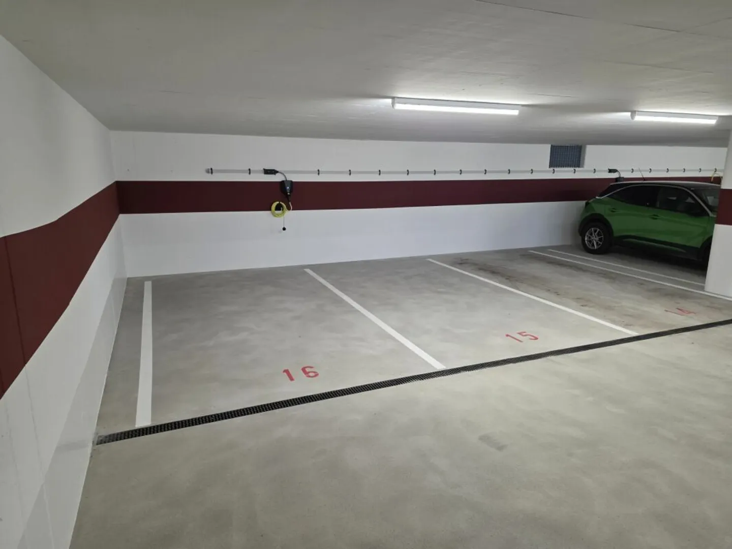 Parking spaces with and without charging station - Photo 2 of 5