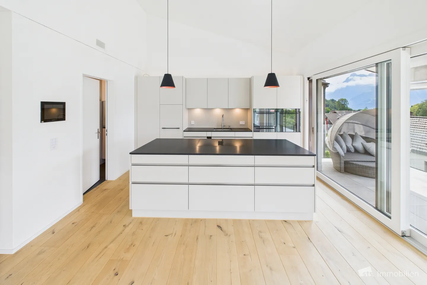 Penthouse moderno con vista lago - Foto 1 di 13