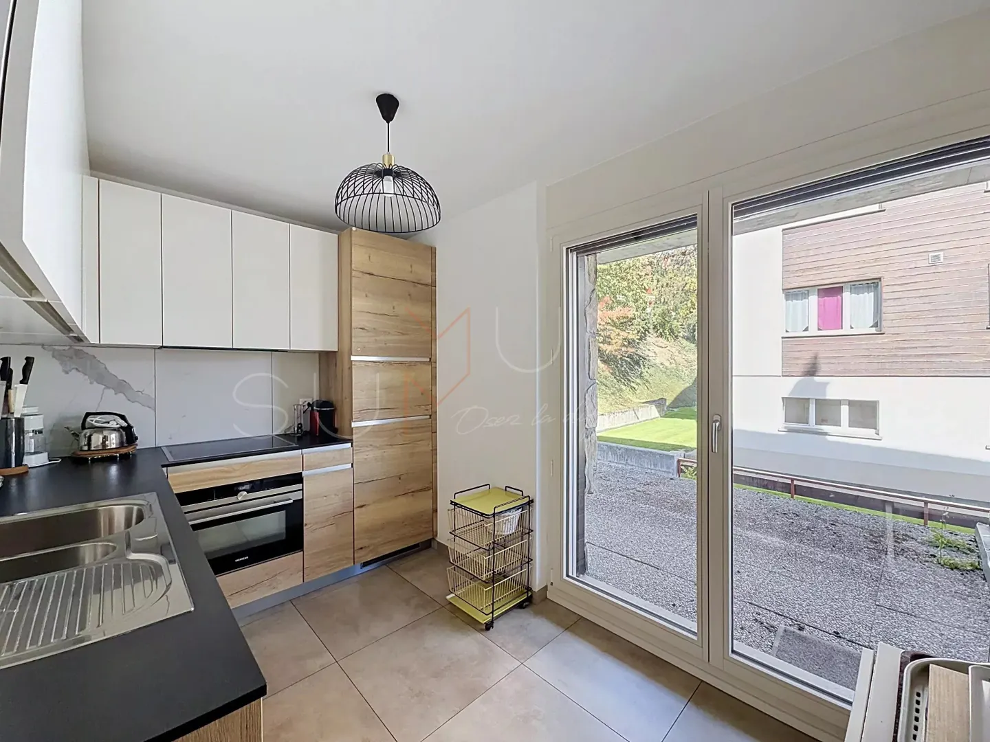 Appartement rénové avec jardin - Photo 6 sur 13