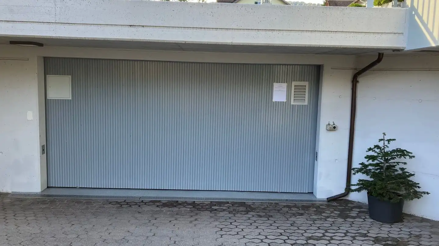 Place de parking souterraine à louer - Kirchgasse 1, 9472 Grabs