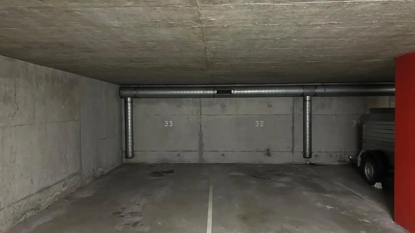 Place de parking souterraine à louer - Pestalozzistrasse 37, 4132 Muttenz