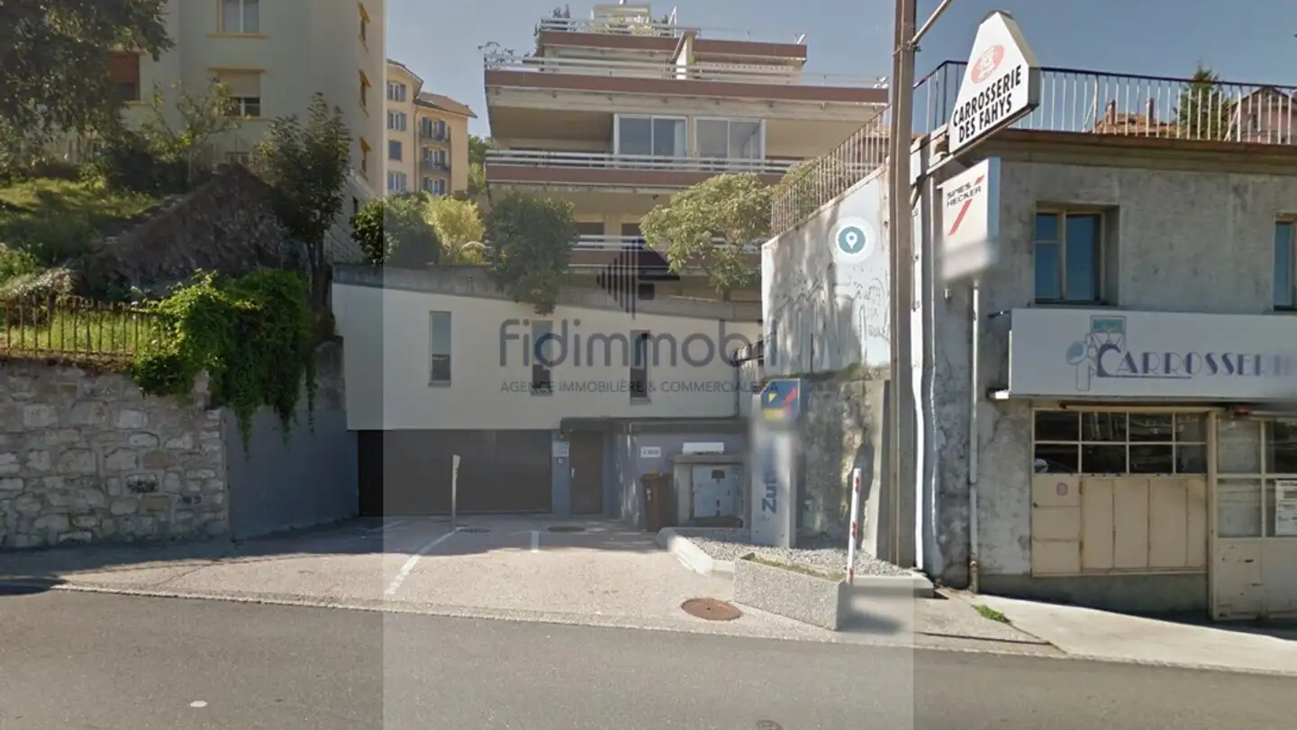 Indoor parking space for rent - Rue Des Fahys 9, 2000 Neuchâtel