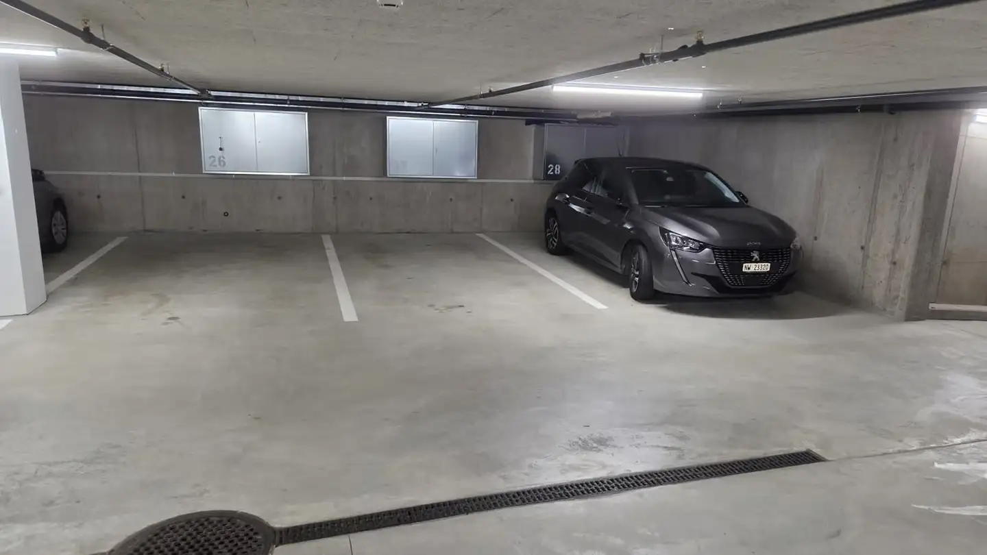 Place de parking souterraine à louer - Tellenmattstrasse 4, 6370 Stans