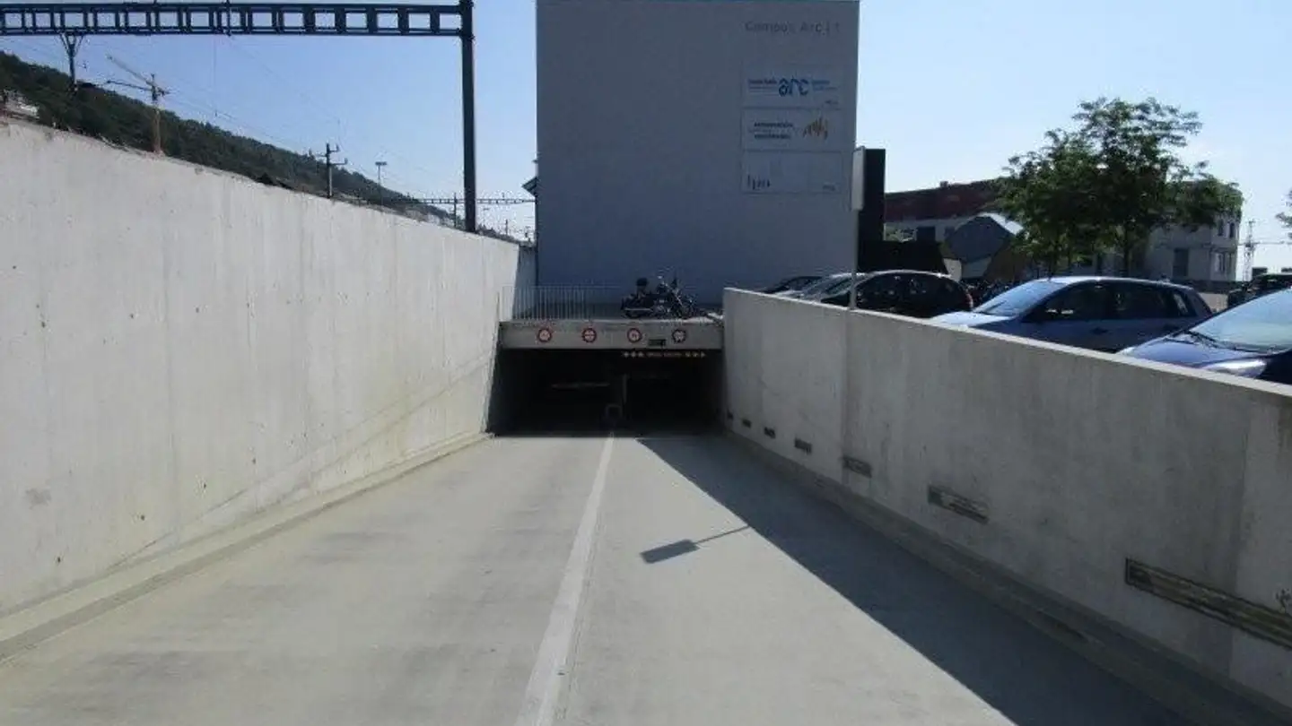 Place de parking souterraine à louer - Espace De L'europe 21, 2000 Neuchâtel - Photo 2