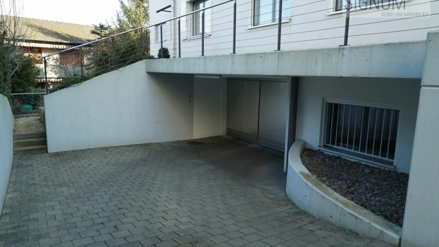 Tiefgaragenstellplatz mieten - Im Kugelfang 27, 4102 Binningen