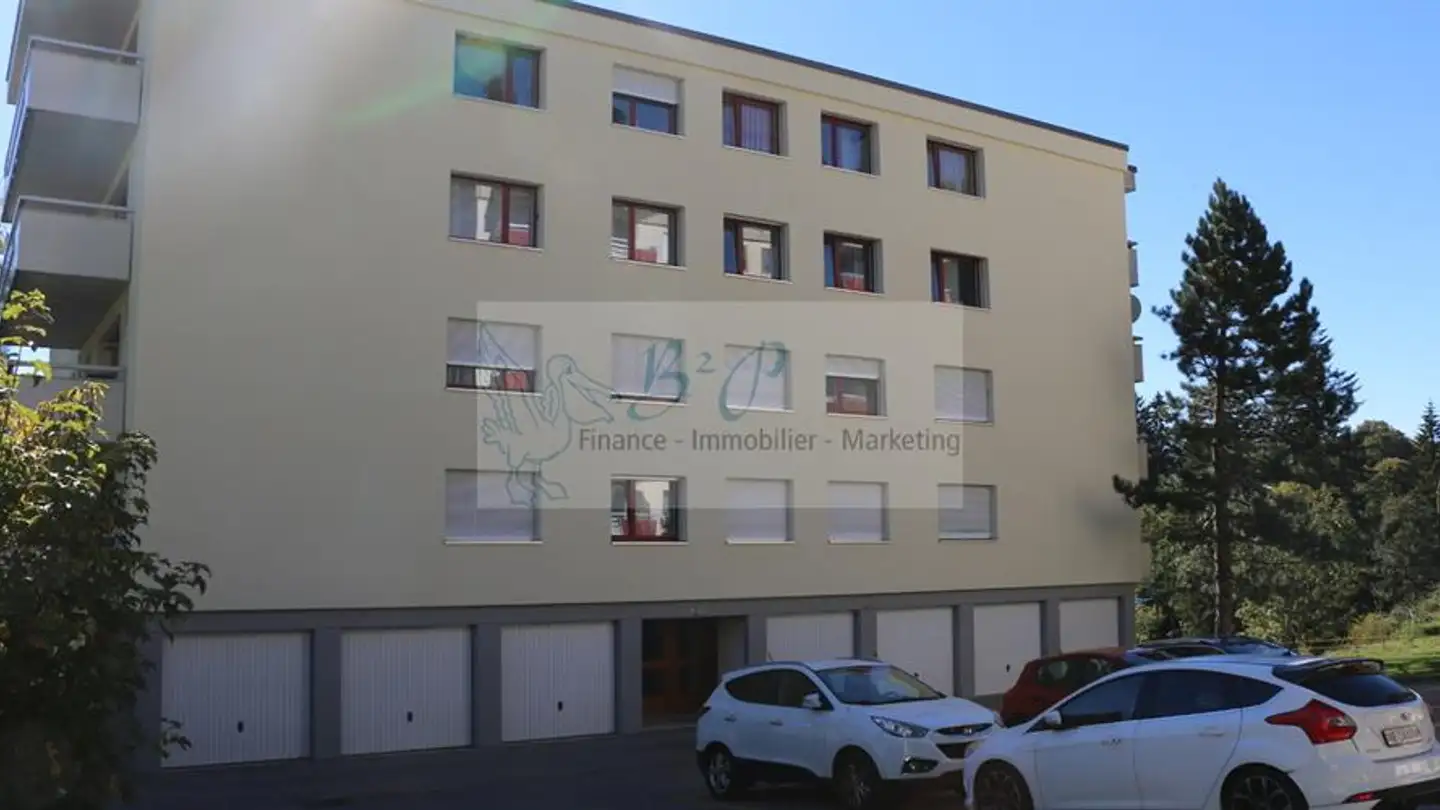 Place de parking couverte à louer - Rue Numa-Droz 102, 2300 La Chaux-de-Fonds