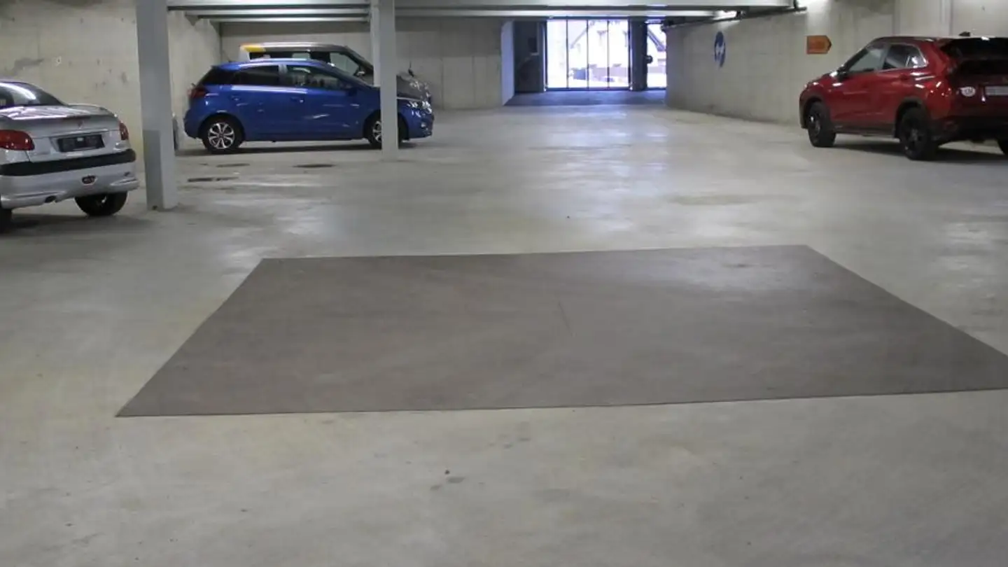 Place de parking souterraine à louer - Rue du Collège 1, 1450 Ste-Croix
