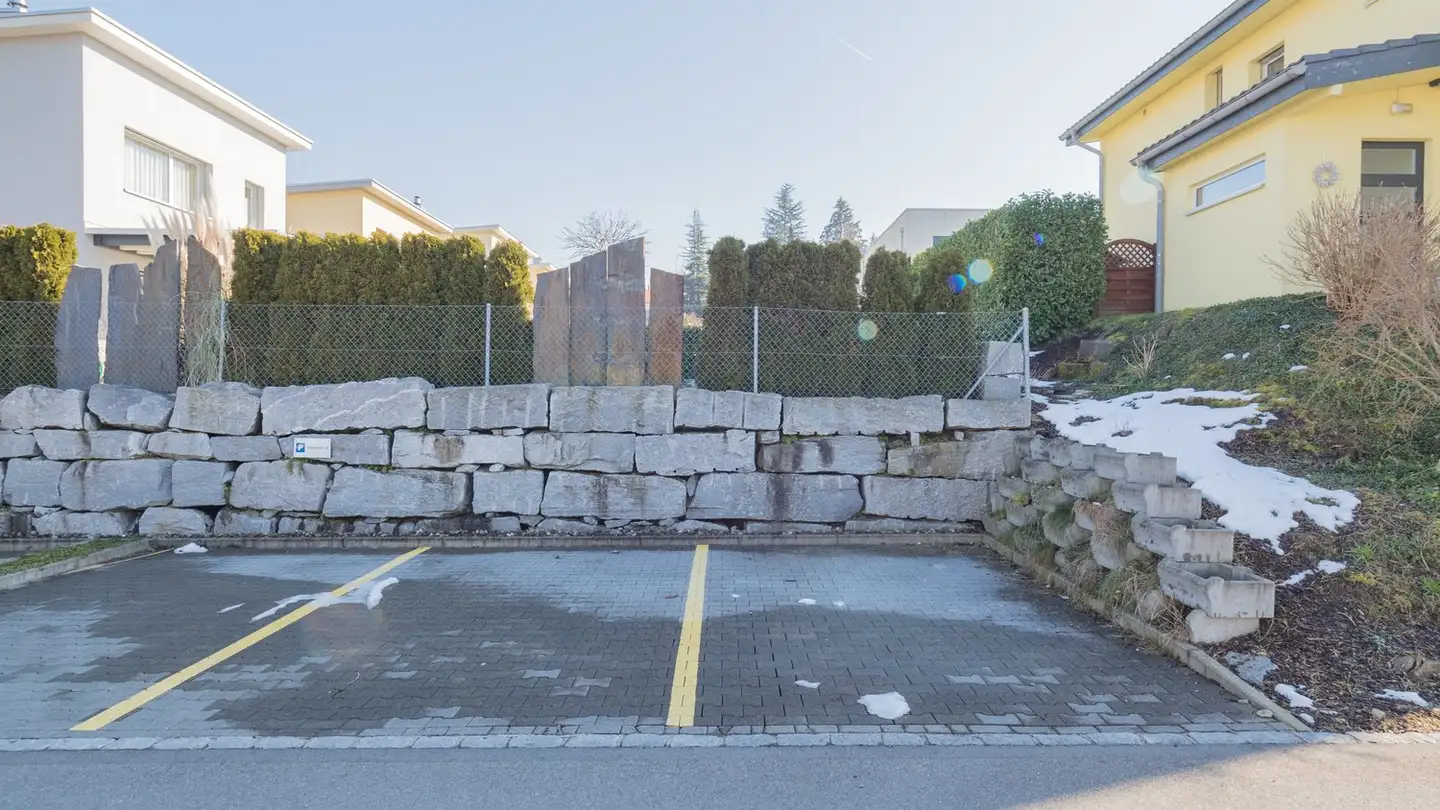 Place de parking extérieure à louer - Rütiweidrain 8, 6033 Buchrain