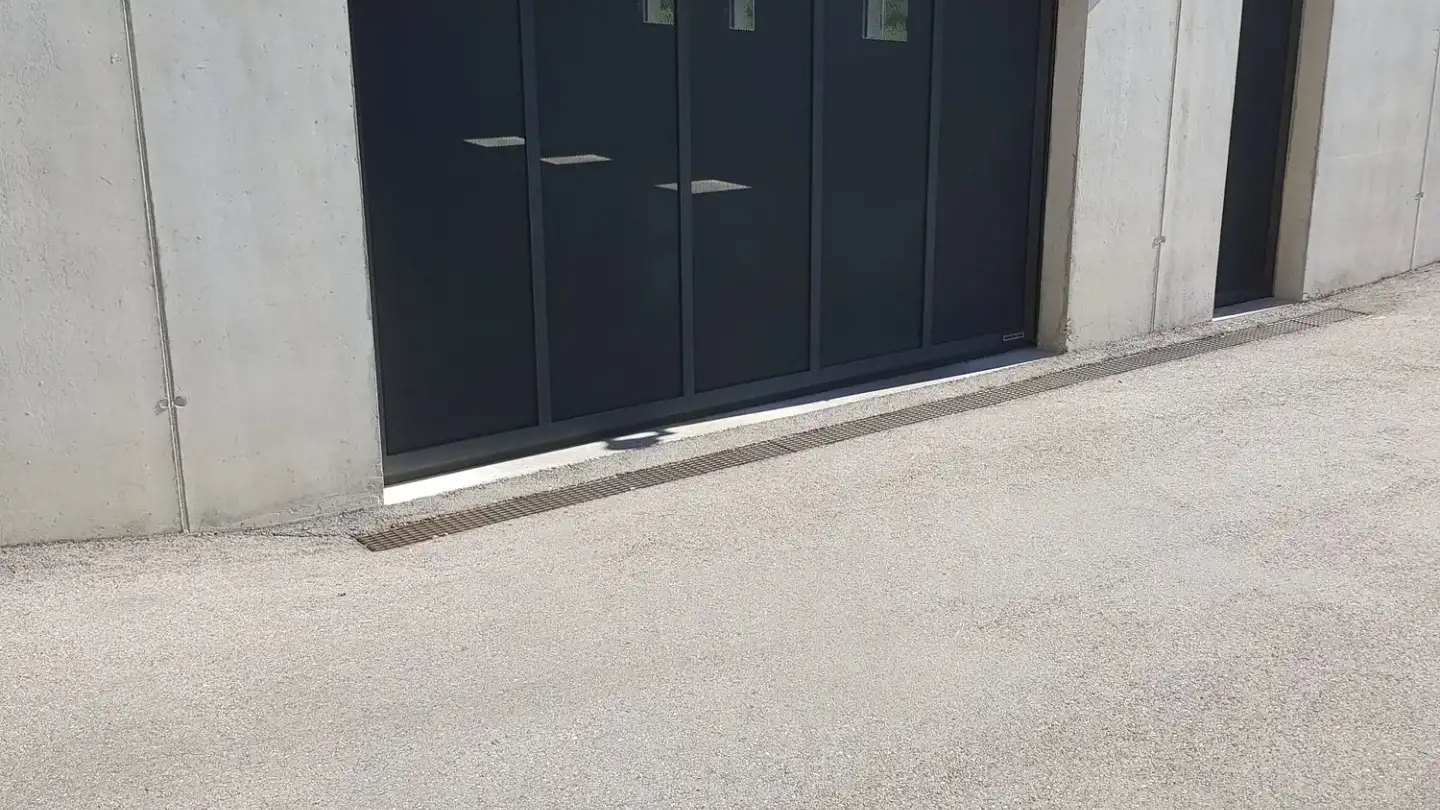 Place de parking souterraine à vendre - Chemin Des Vergers 8, 2206 Les Geneveys-sur-Coffrane - Photo 2