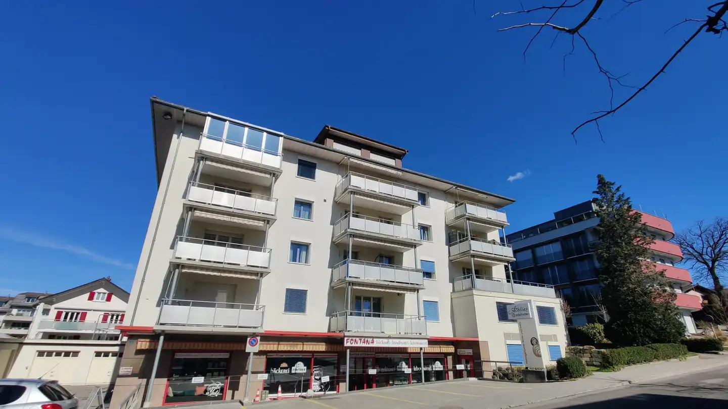 Place de parking extérieure à louer - Bahnhofstrasse 15, 3186 Düdingen