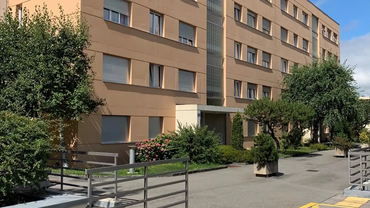 Place de parking couverte à louer - Rue Du Bugnon 39, 1020 Renens VD