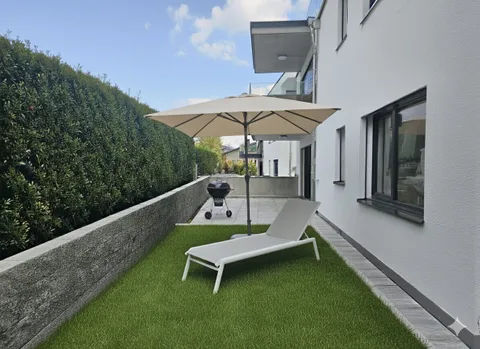 NEUBAU AN TOP LAGE (WHG-C) MIT GROSSZÜIGIGER SITZTPLATZ 40 m2 & EIGNE WASCHKÜCHE UND KELLER (17,4 m2)