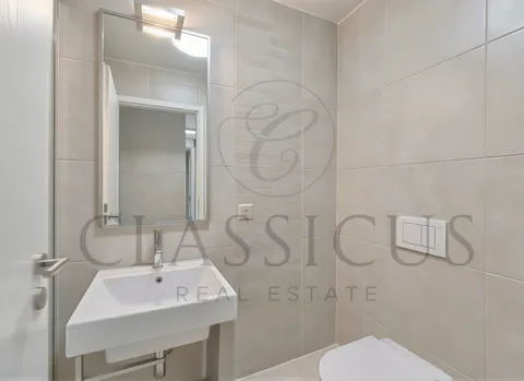 La Plaine – Appartement 4 pièces contemporain avec balcon, parking intérieur et accès immédiat à la gare