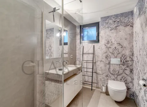 Aux portes de Carouge – Maison contemporaine avec rooftop jacuzzi et jardin paysager