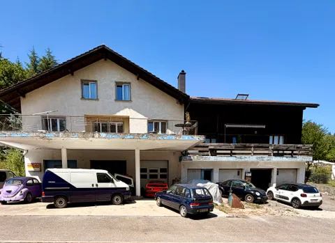 Garage &#8211; station service et 3 appartements