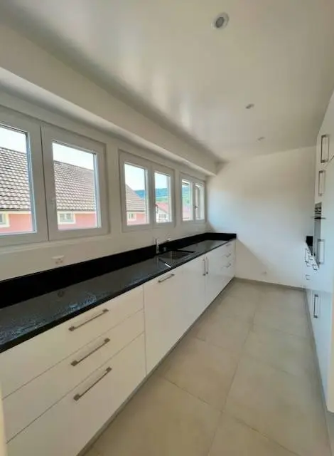 Appartement D – 2,5 pièces avec balcon et mezzanine – Cadre agréable à Couvet