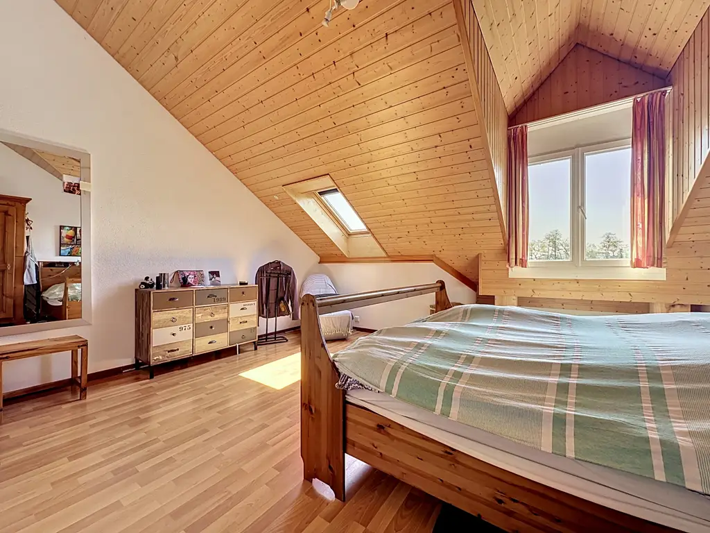 Duplex lumineux aux volumes généreux au cœur de Servion