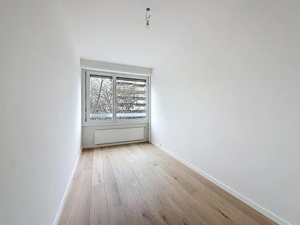 Champel / Parc Bertrand – Appartement 5 pièces en excellent état avec balcon et parking intérieur