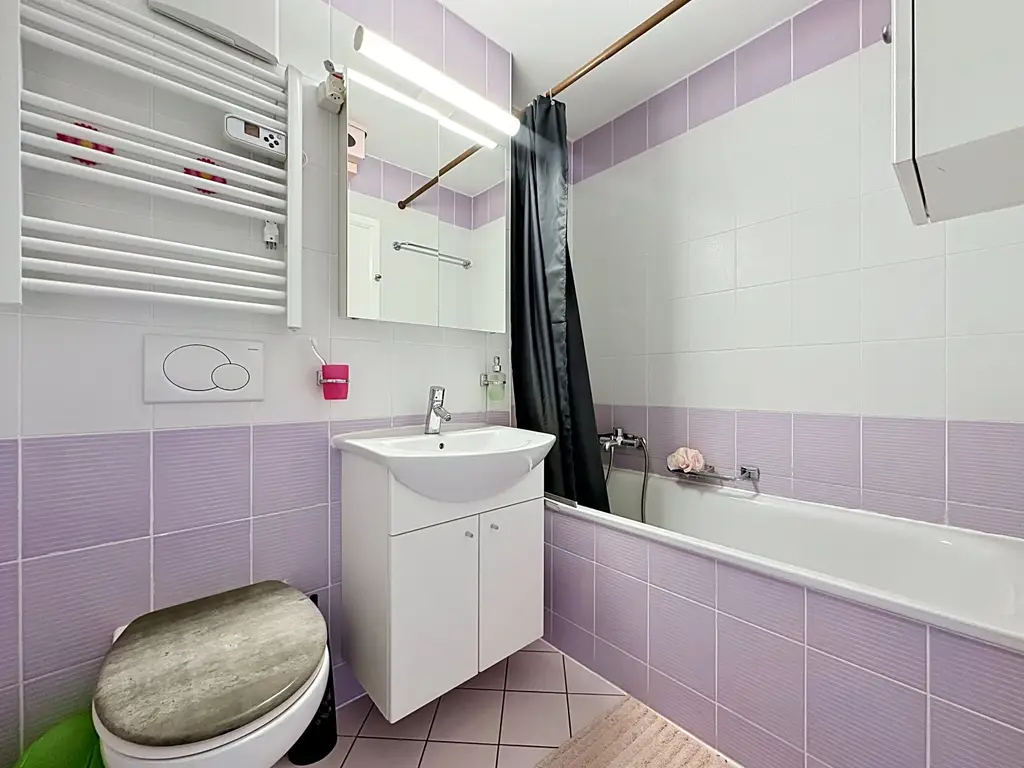 Duplex lumineux aux volumes généreux au cœur de Servion