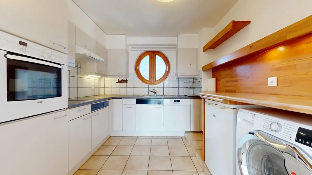 Duplex 4,5 pièces avec cheminée et 3 places de parc