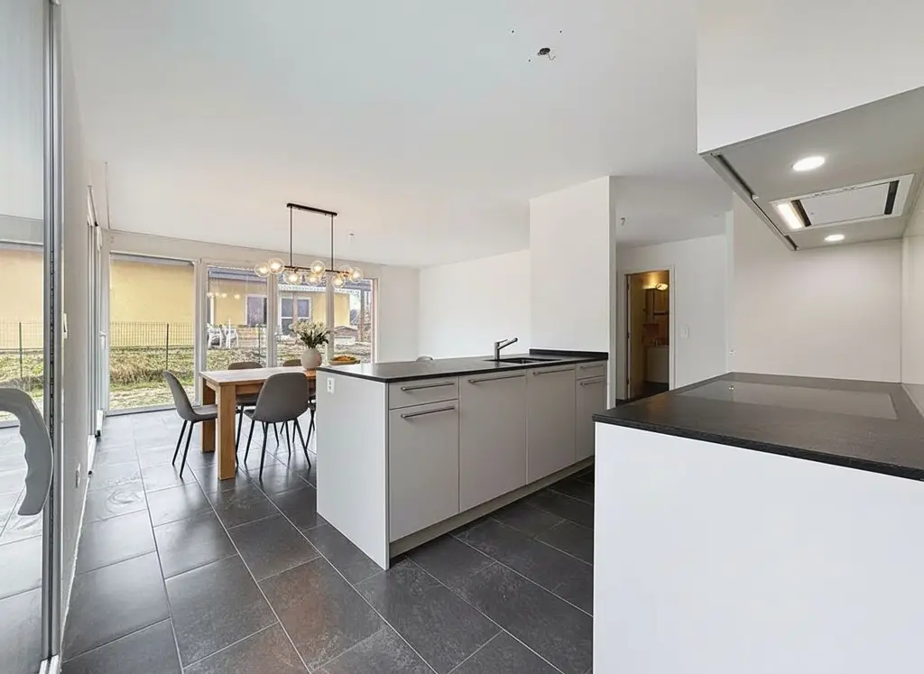 Appartement en rez-de-jardin avec grand jardin ensoleillé, un art de vivre rare