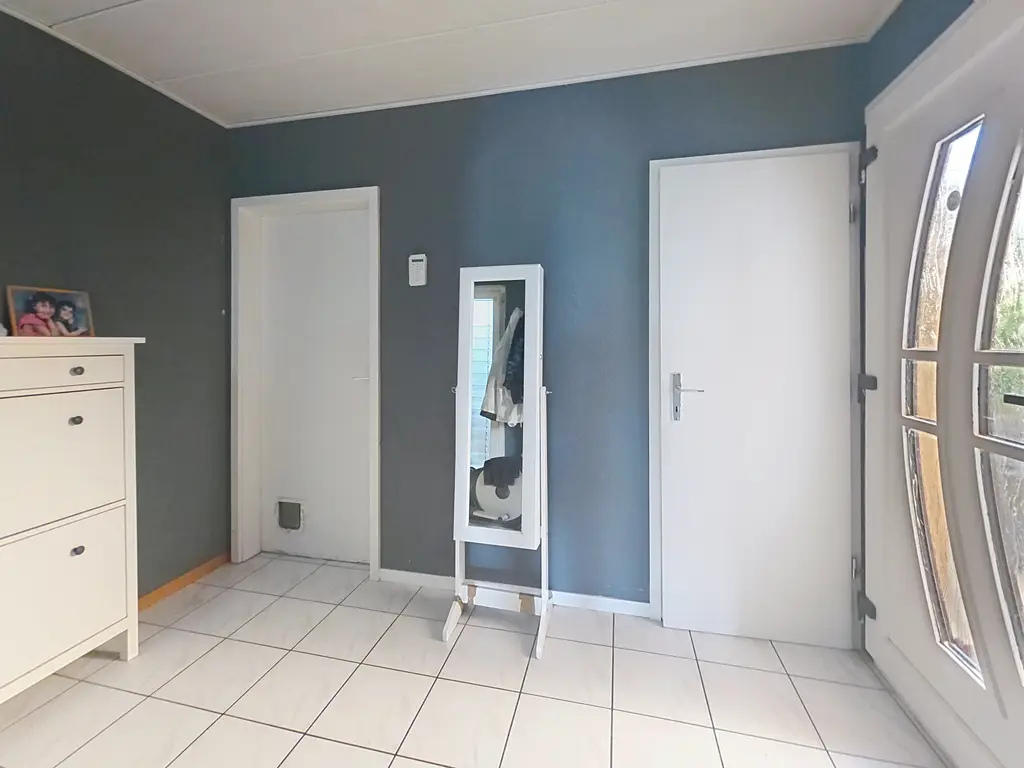 Maison jumelle familiale avec terrasse et garage