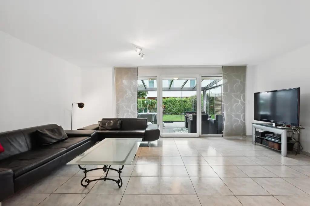Magnifique duplex de 5,5 p avec véranda et jardin, comme dans votre maison
