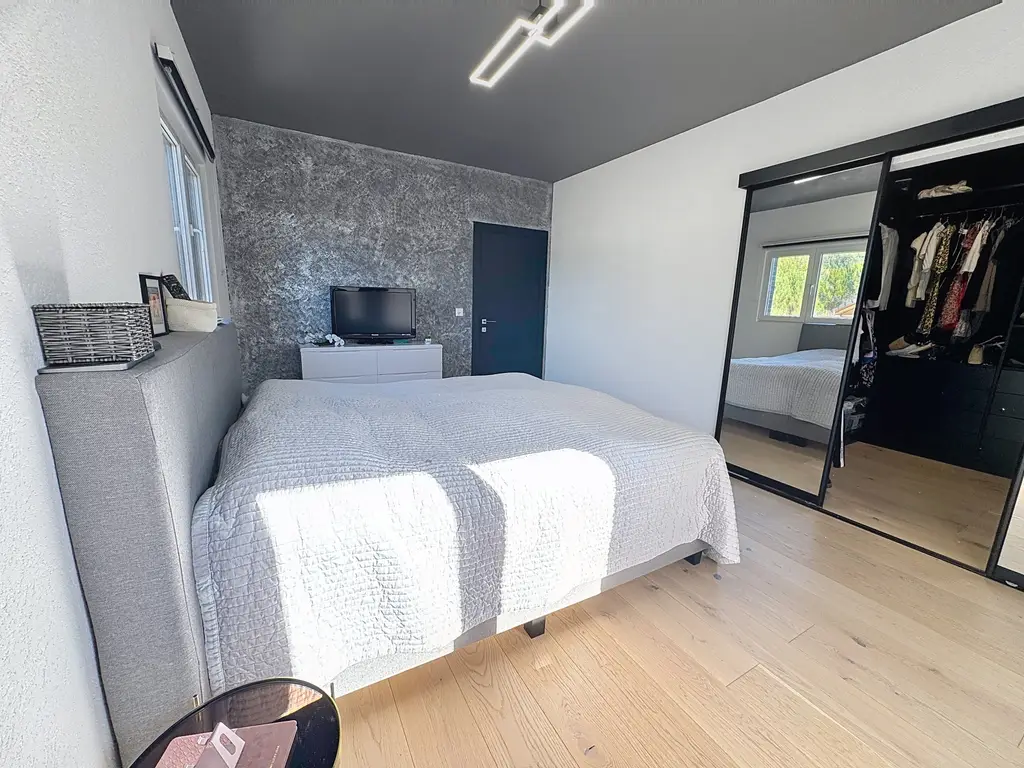 Villa mitoyenne contemporaine avec jardin, finitions haut de gamme et calme absolu
