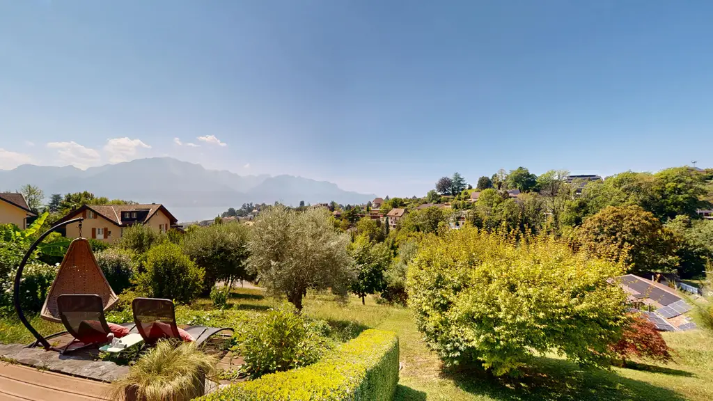 Maison de 5,5 pièces avec vue dégagée sur le lac et les montagnes