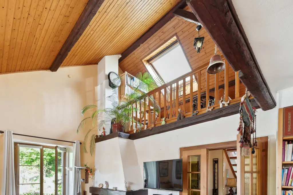 Cachet et exclusivité: magnifique appartement duplex de 6,5 pièces avec jardin et terrasses privés
