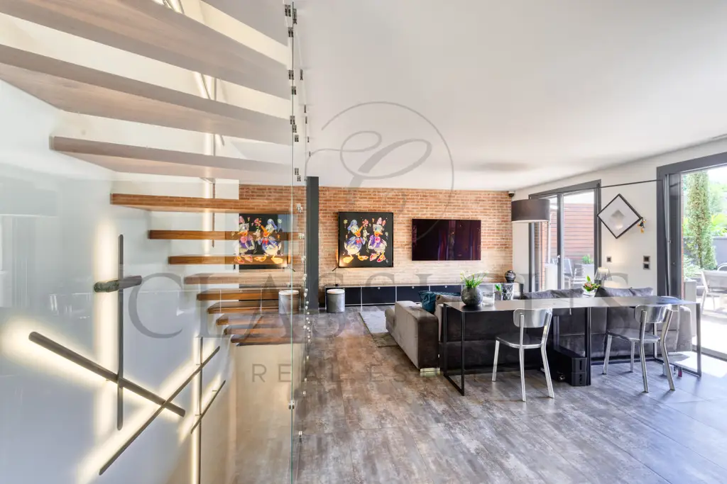 Aux portes de Carouge – Maison contemporaine avec rooftop jacuzzi et jardin paysager