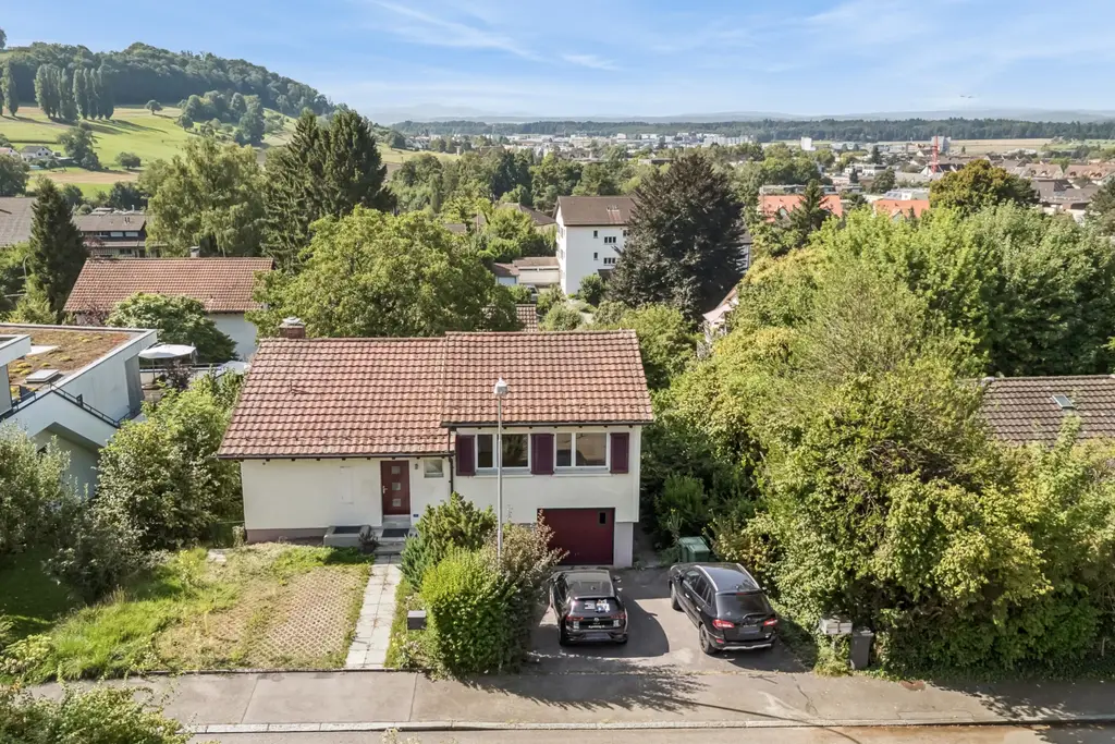EINFAMILEINAUS MIT EINLIEGERWOHNUNG