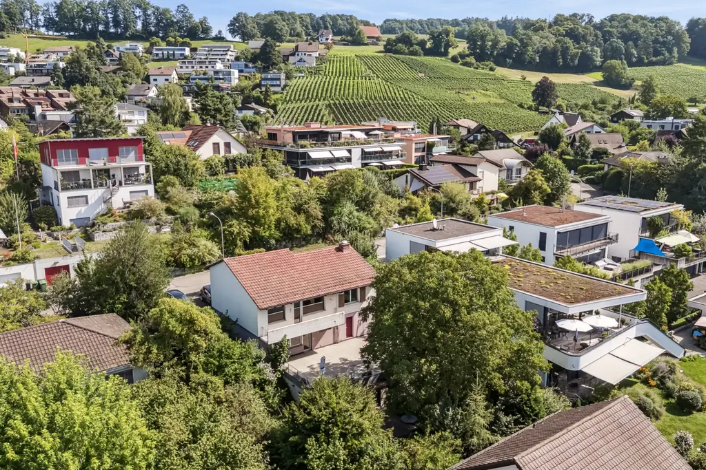EINFAMILEINAUS MIT EINLIEGERWOHNUNG