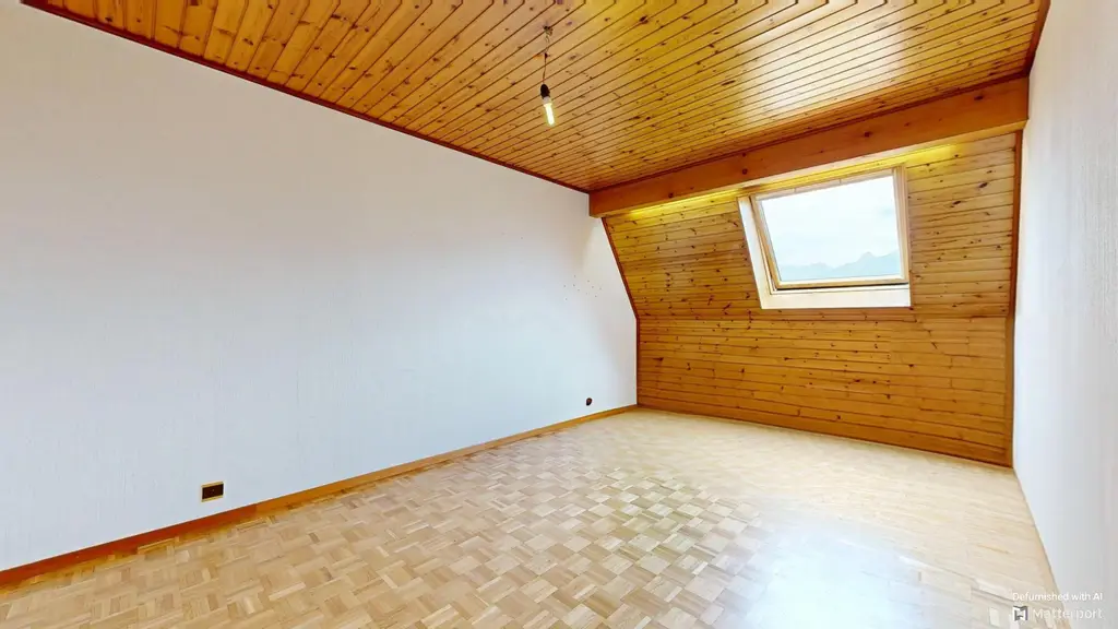 Duplex de 4,5 pièces en attique