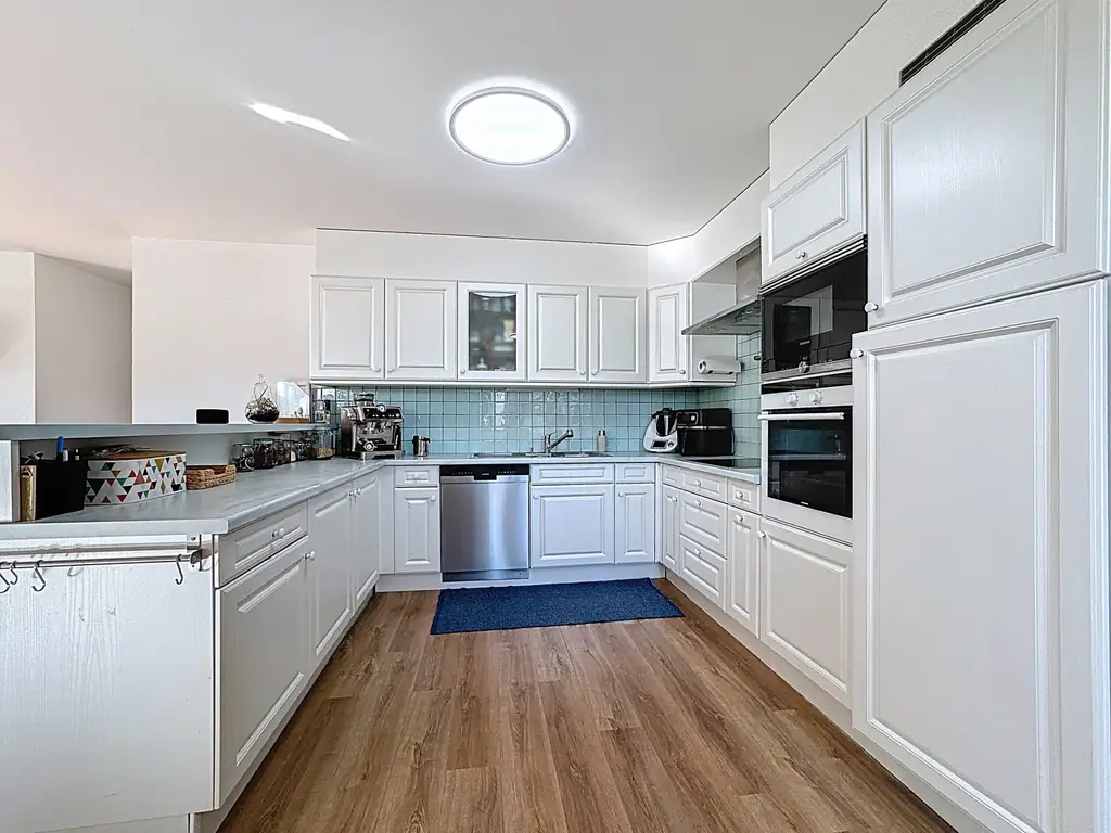 Spacieux et lumineux 4.5 pièces au rez-de-chaussée avec jardin privé