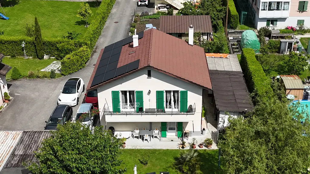 Maison individuelle divisée en deux appartements de 3.5 pièces