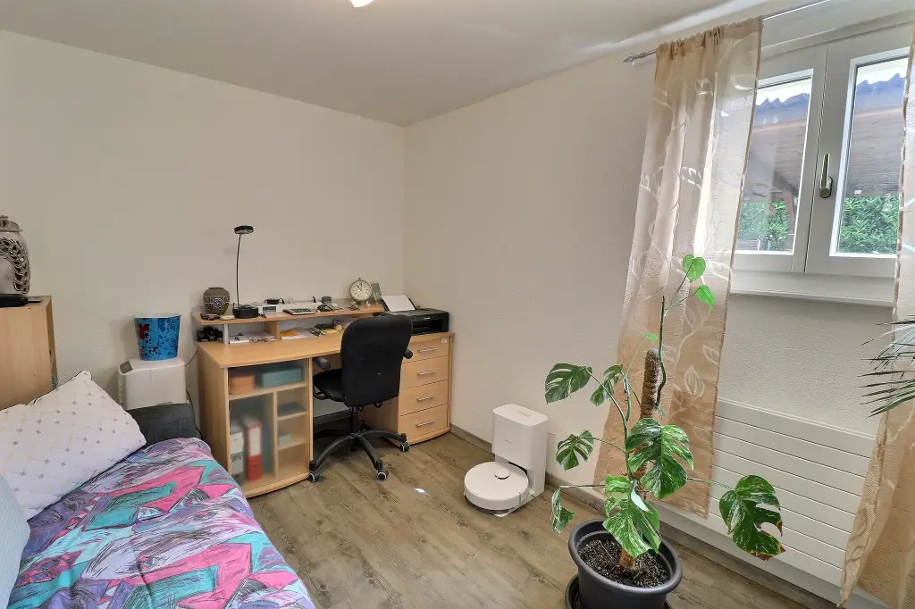 Maison individuelle divisée en deux appartements de 3.5 pièces