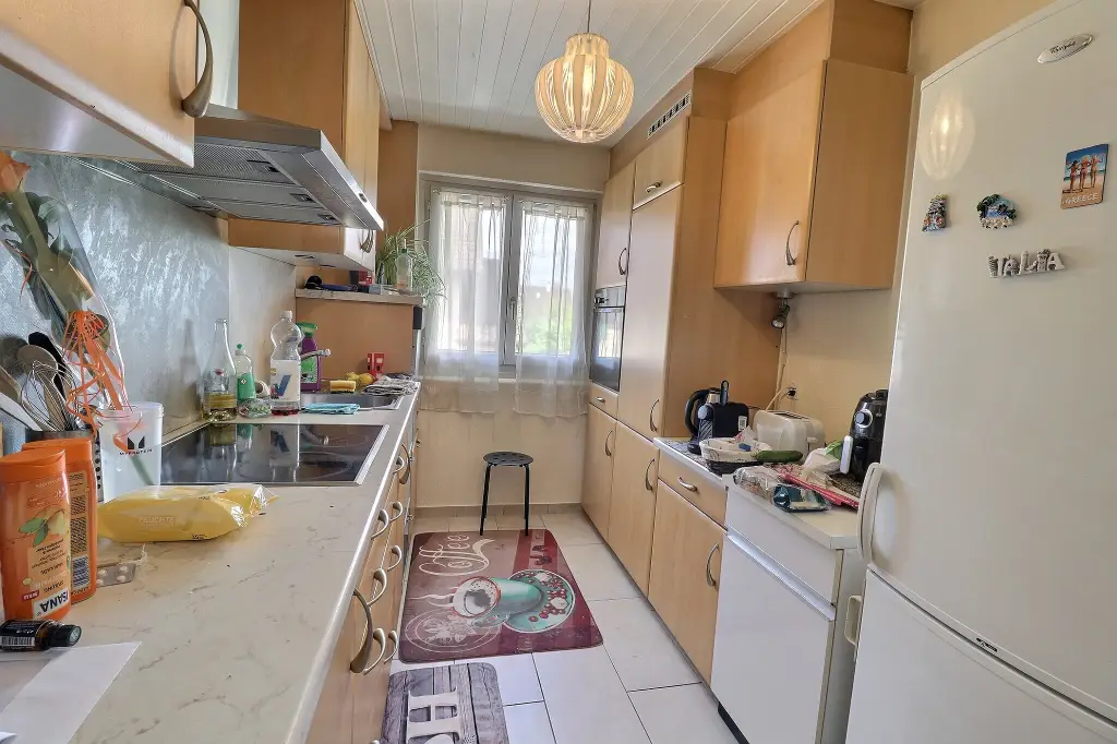 Maison individuelle divisée en deux appartements de 3.5 pièces
