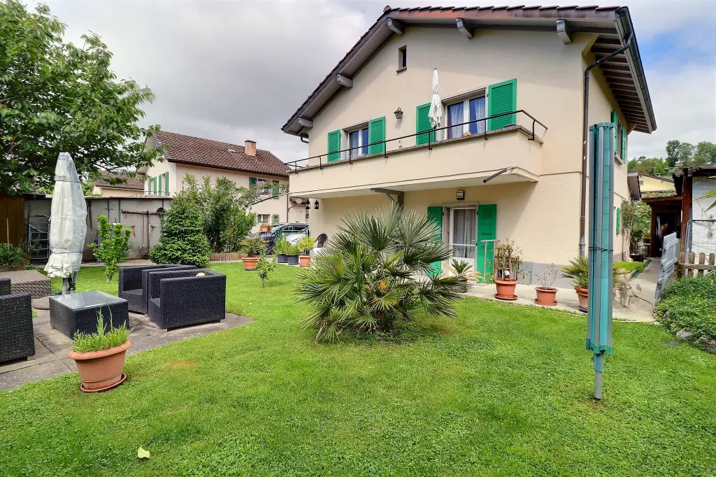 Maison individuelle divisée en deux appartements de 3.5 pièces
