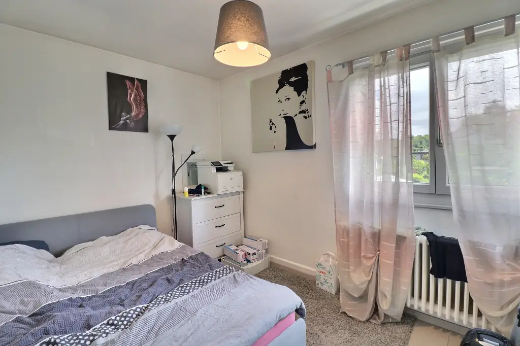 Maison individuelle divisée en deux appartements de 3.5 pièces