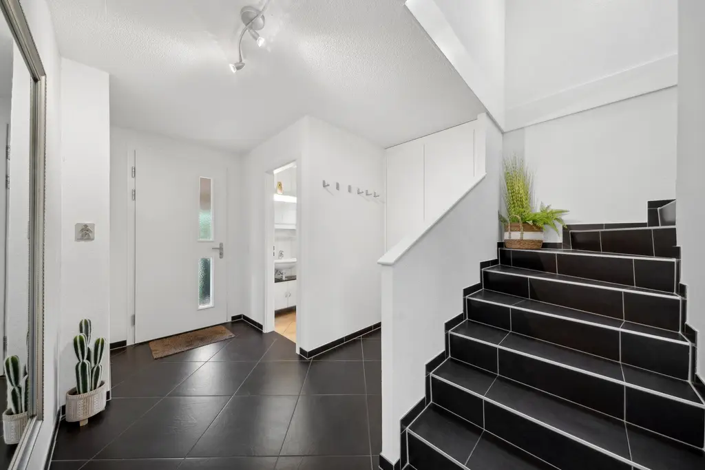 Coup de coeur pour cette magnifique maison individuelle de 5,5 pièces dans un quartier résidentiel prisé, grand jardin (parcelle de 1013 m2)