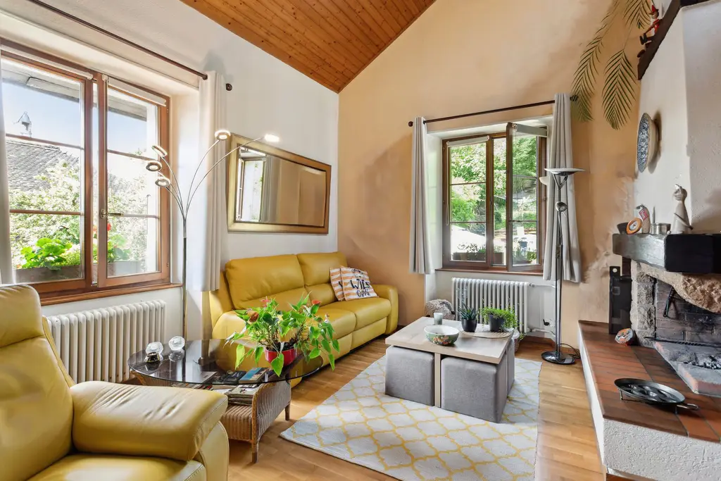 Cachet et exclusivité: magnifique appartement duplex de 6,5 pièces avec jardin et terrasses privés