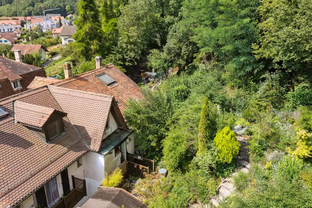Cachet et exclusivité: magnifique appartement duplex de 6,5 pièces avec jardin et terrasses privés